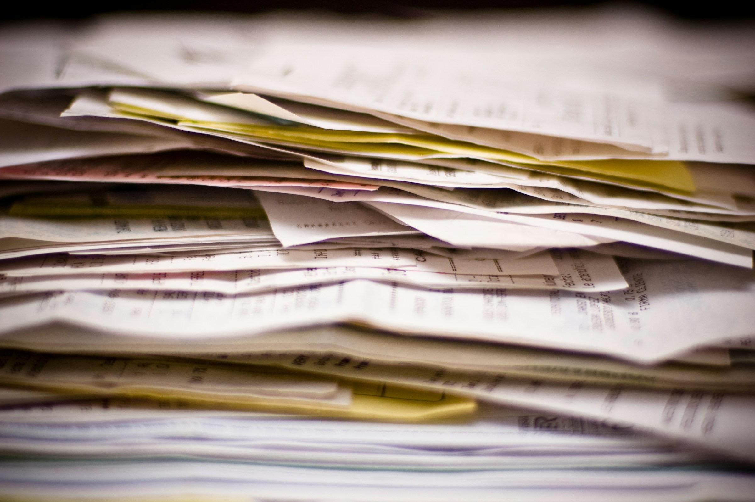 A stack of reviewed credit files