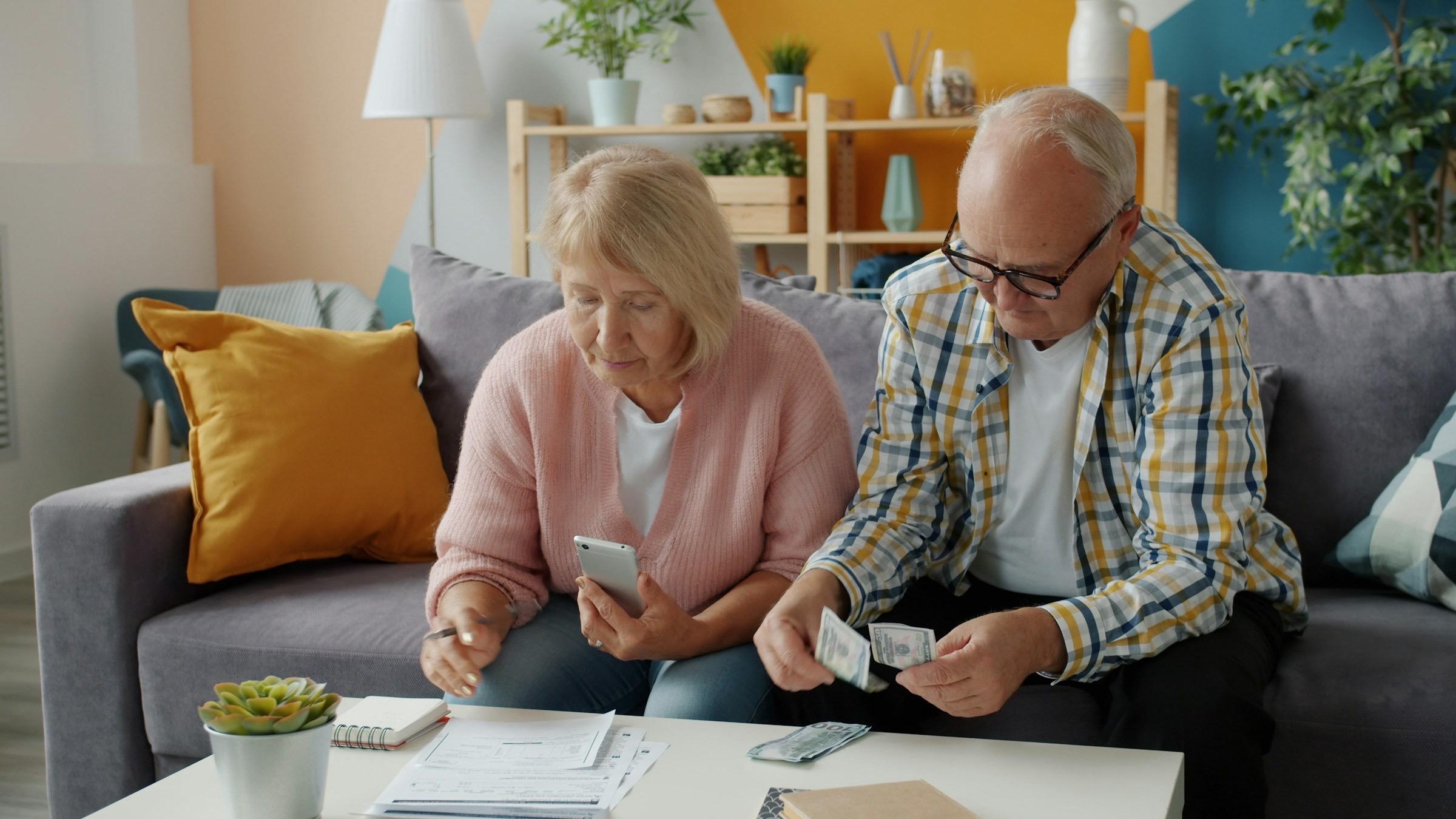 A couple reviewing household finances at home